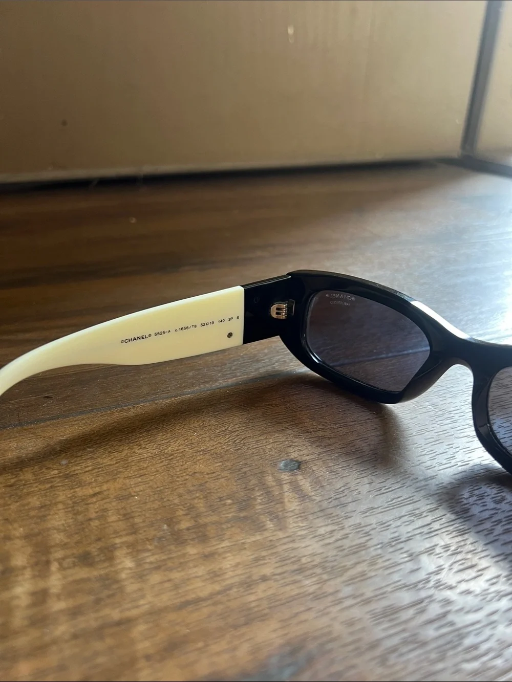 CHANEL Black Frame Sunglasses with White Temples
